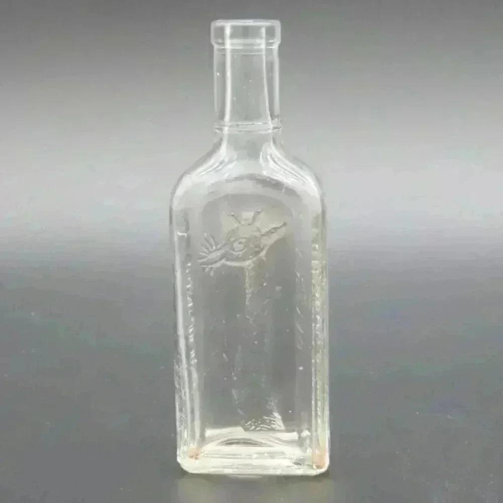Tonsiline sore throat medicine bottle & Souder's Flavoring Extract bottle